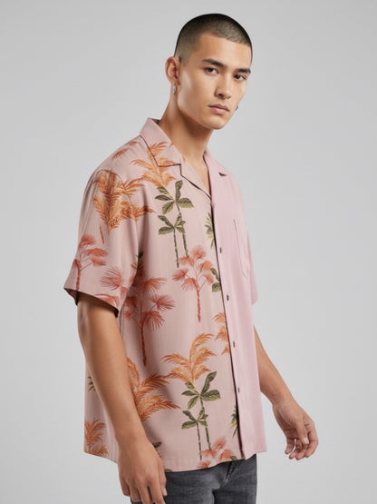 Atsignatsign Official pink oversized rayon Hawaiian shirt with palm tree print and solid pink panel, wood buttons.